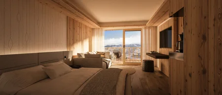 Gemütliches Hotelzimmer mit Holzwänden und Bergblick vom Balkon